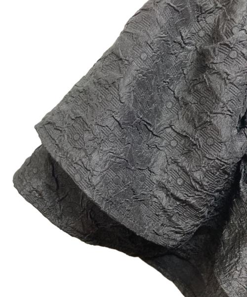 UNMINOU（アンミヌ）UNMINOU (アンミヌ) ダブルフレアジャガードトップス ブラック サイズ:Freeの古着・服飾アイテム