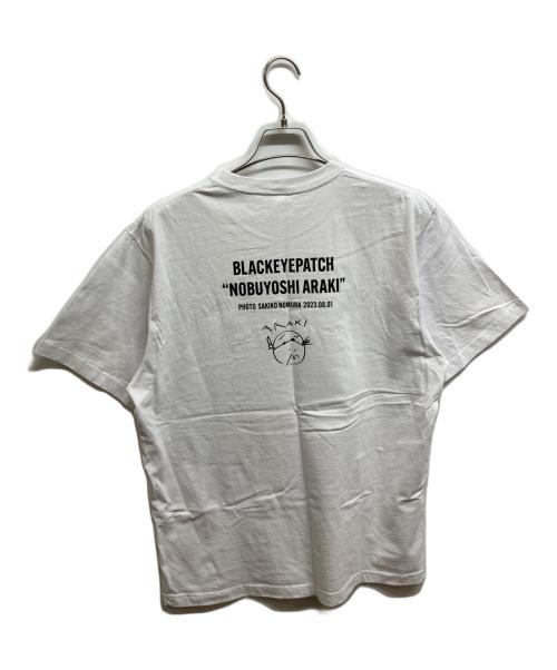 THE BLACK EYE PATCH（ブラックアイパッチ）THE BLACK EYE PATCH (ブラックアイパッチ) 荒木経惟 プリントtシャツ ホワイト サイズ:Lの古着・服飾アイテム