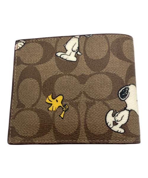 COACH（コーチ）COACH (コーチ) PEANUTS (ピーナッツ) ウォレット・シグネチャー・スヌーピー ウッドストック ベージュの古着・服飾アイテム