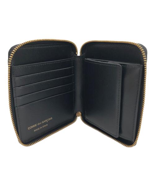 COMME des GARCONS（コムデギャルソン）COMME des GARCONS (コムデギャルソン) ラウンド型ジップウォレット ブラックの古着・服飾アイテム