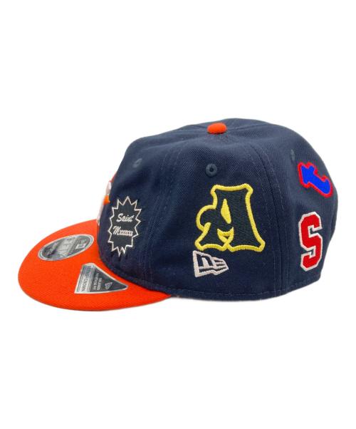 New Era（ニューエラ）New Era (ニューエラ) SAINT MICHAEL (セントマイケル) コラボベースボールキャップ オレンジ×ネイビーの古着・服飾アイテム
