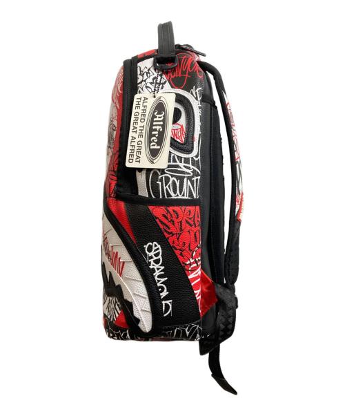 SPRAYGROUND（スプレーグランド）SPRAYGROUND (スプレーグランド) リュック レッド×ブラックの古着・服飾アイテム