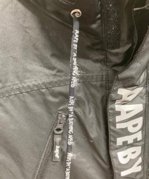 Aape BY A BATHING APE（エーエイプ バイ アベイシングエイプ）Aape BY A BATHING APE (エーエイプ バイ アベイシングエイプ) フーデッドナイロンジャケット ブラック サイズ:Sの古着・服飾アイテム