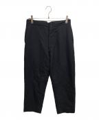 COMOLIコモリ）の古着「WOOL SERGE BACK STRAP PANTS」｜ブラック