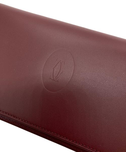 Cartier（カルティエ）Cartier (カルティエ) 二つ折り長財布 レッドの古着・服飾アイテム