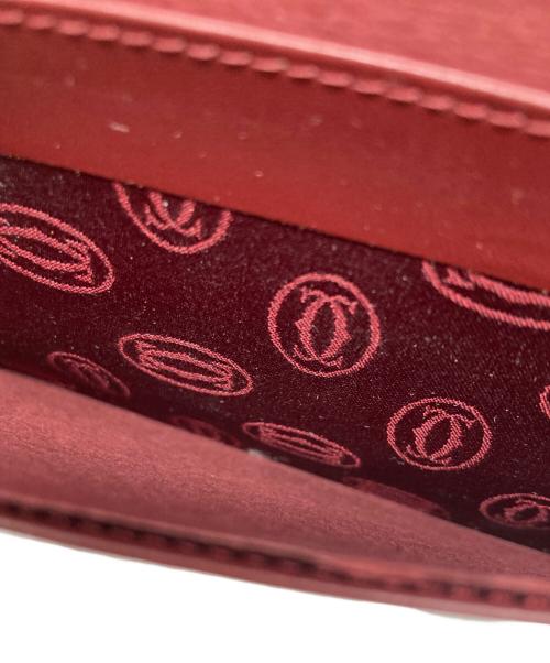 Cartier（カルティエ）Cartier (カルティエ) 二つ折り長財布 レッドの古着・服飾アイテム