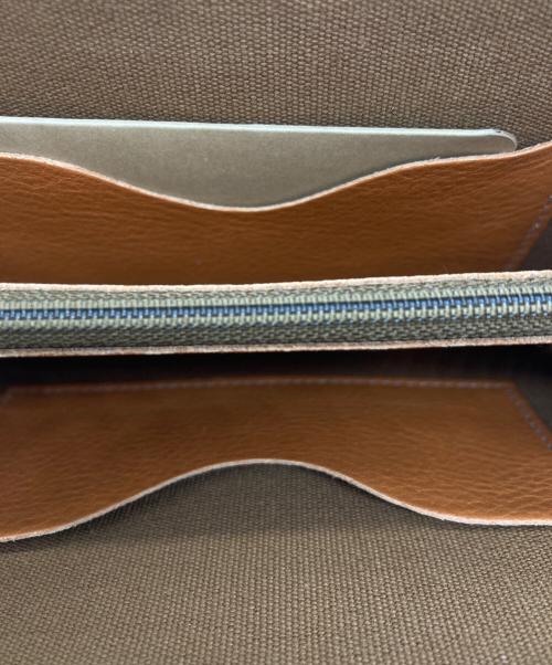 IL BISONTE（イル ビゾンテ）IL BISONTE (イル ビゾンテ) 長財布 オレンジの古着・服飾アイテム