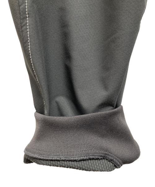 and wander（アンドワンダー）and wander (アンドワンダー) ライトストレッチシェルパンツ グレー サイズ:XLの古着・服飾アイテム