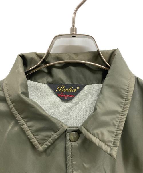 Bodies by WAREHOUSE（ボーディーズバイウェアハウス）Bodies by WAREHOUSE (ボーディーズバイウェアハウス) コーチジャケット カーキ サイズ:XLの古着・服飾アイテム