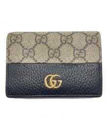 GUCCI（グッチ）の古着「2つ折り財布」｜ベージュ