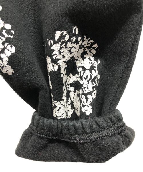Denim Tears（デニムティアーズ）Denim Tears (デニムティアーズ) 総柄 裏起毛スウェットパンツ ブラック サイズ:Lの古着・服飾アイテム