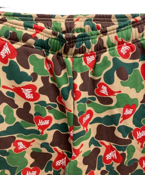MOBB（モブ）MOBB (モブ) HEART DRIP CAMO PANTS/MoBBパンツ カーキ サイズ:L 未使用品の古着・服飾アイテム