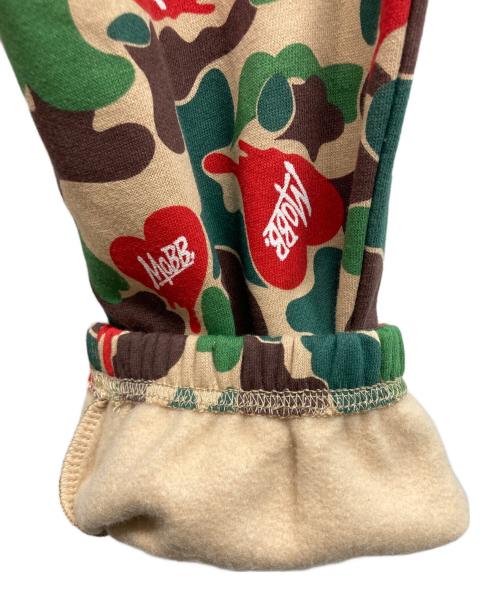 MOBB（モブ）MOBB (モブ) HEART DRIP CAMO PANTS/MoBBパンツ カーキ サイズ:L 未使用品の古着・服飾アイテム