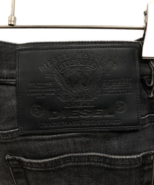 DIESEL（ディーゼル）DIESEL (ディーゼル) ブリーチ加工デニムパンツ ブラック サイズ:33の古着・服飾アイテム