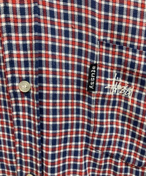 stussy（ステューシー）stussy (ステューシー) 紺タグ チェックシャツ レッド×ネイビー サイズ:XLの古着・服飾アイテム