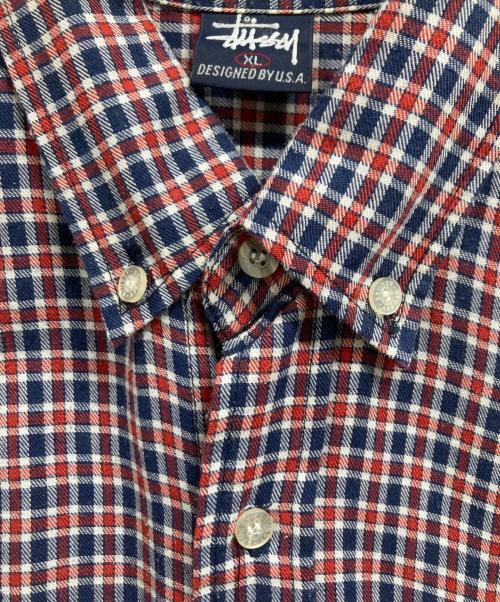 stussy（ステューシー）stussy (ステューシー) 紺タグ チェックシャツ レッド×ネイビー サイズ:XLの古着・服飾アイテム
