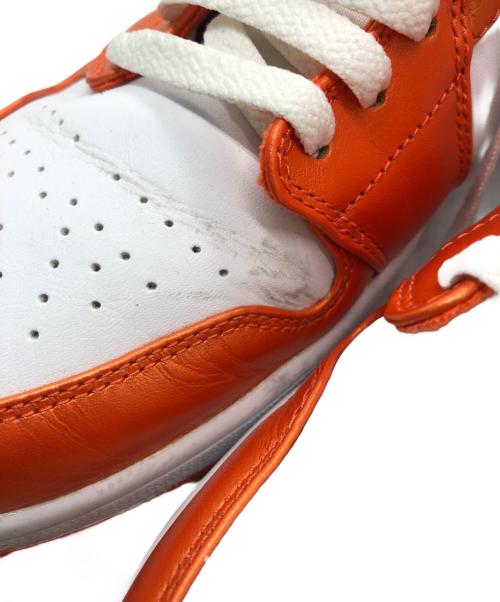 NIKE（ナイキ）NIKE (ナイキ) AIR JORDAN 1 MID SE ハイカットスニーカー ホワイト×オレンジ サイズ:29の古着・服飾アイテム