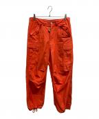 AVIREXアヴィレックス）の古着「M-65 FATIGUE PANTS」｜オレンジ