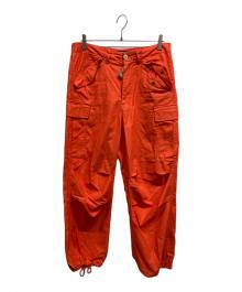 AVIREX（アヴィレックス）の古着「M-65 FATIGUE PANTS」｜オレンジ