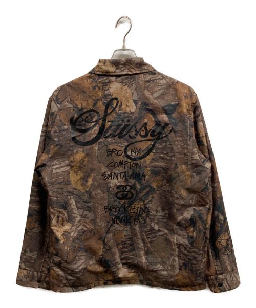 stussy（ステューシー）stussy (ステューシー) ワールドツアーコーチジャケット ブラウン サイズ:Lの古着・服飾アイテム