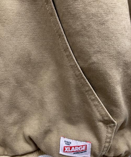 X-LARGE（エクストララージ）X-LARGE (エクストララージ) フーデッドワークジャケット ベージュ サイズ:Mの古着・服飾アイテム