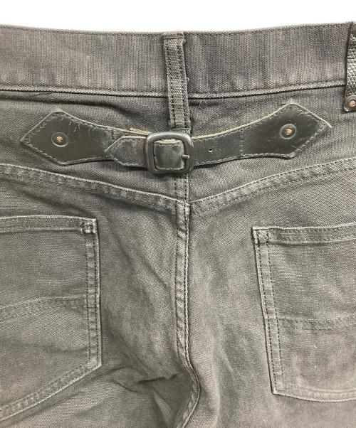 ISAMU KATAYAMA BACKLASH（イサムカタヤマ・バックラッシュ）ISAMU KATAYAMA BACKLASH (イサムカタヤマ・バックラッシュ) フレアパンツ ブラック サイズ:FREEの古着・服飾アイテム