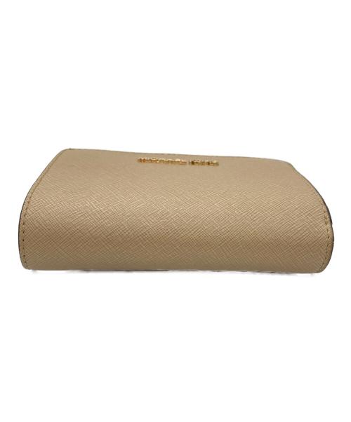 MICHAEL KORS（マイケルコース）MICHAEL KORS (マイケルコース) 2つ折り財布 ベージュの古着・服飾アイテム