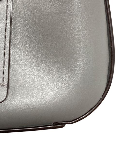 COACH（コーチ）COACH (コーチ) イーディーターン ロック レザーチェーントート バッグ グレーの古着・服飾アイテム