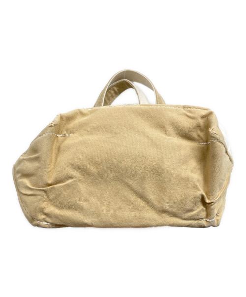 L.L.Bean（エルエルビーン）L.L.Bean (エルエルビーン) REMI RELIEF (レミレリーフ) キャンバスハンドバッグ ホワイト×ベージュの古着・服飾アイテム