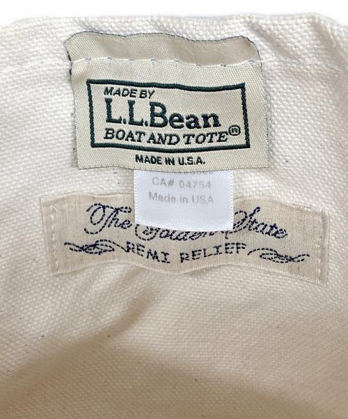 L.L.Bean（エルエルビーン）L.L.Bean (エルエルビーン) REMI RELIEF (レミレリーフ) キャンバスハンドバッグ ホワイト×ベージュの古着・服飾アイテム