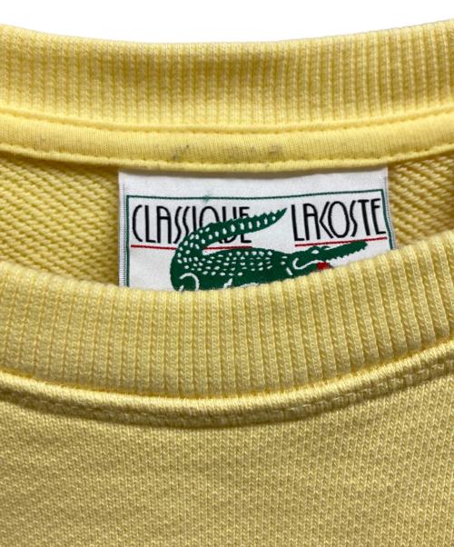 LACOSTE（ラコステ）LACOSTE (ラコステ) フロッキークロックプリントスウェットシャツ イエロー サイズ:36の古着・服飾アイテム