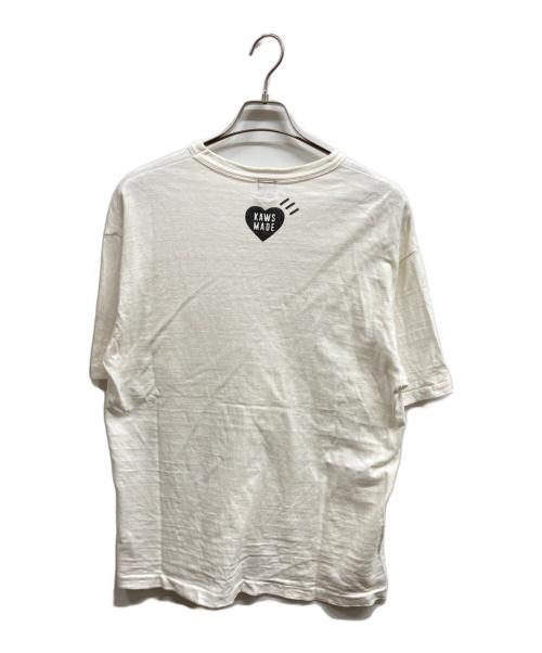 HUMAN MADE（ヒューマンメイド）HUMAN MADE (ヒューマンメイド) KAWS (カウズ) メイドグラフィックTシャツ ホワイト サイズ:Lの古着・服飾アイテム