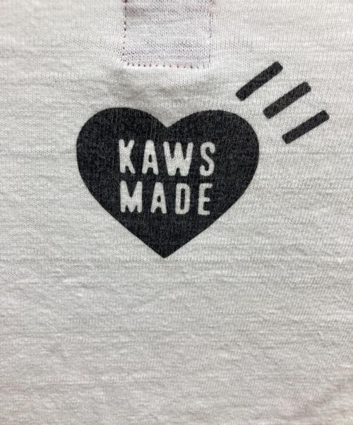 HUMAN MADE（ヒューマンメイド）HUMAN MADE (ヒューマンメイド) KAWS (カウズ) メイドグラフィックTシャツ ホワイト サイズ:Lの古着・服飾アイテム