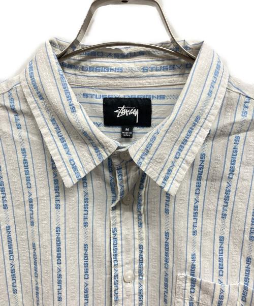 stussy（ステューシー）stussy (ステューシー) Jacquard Logo Stripe／stussy ホワイト×ブルー サイズ:Mの古着・服飾アイテム