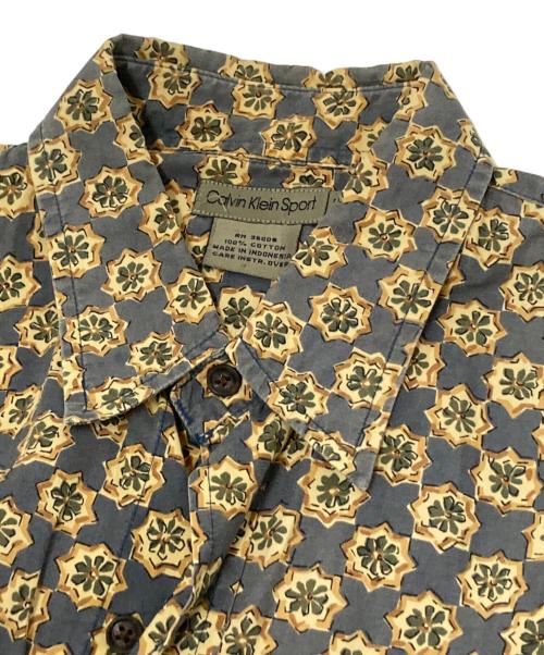 Calvin Klein Sports（カルバンクラインスポーツ）Calvin Klein Sports (カルバンクラインスポーツ) 総柄半袖シャツ ネイビー×ベージュ サイズ:Lの古着・服飾アイテム