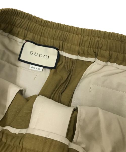 GUCCI（グッチ）GUCCI (グッチ) PRINTED LOGO LEG SHORT オリーブ サイズ:50の古着・服飾アイテム