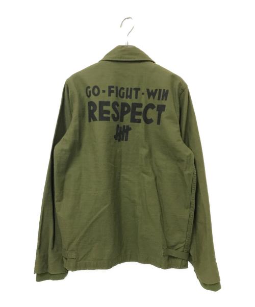 UNDEFEATED（アンディフィーテッド）UNDEFEATED (アンディフィーテッド) ミリタリージャケット オリーブ サイズ:Sの古着・服飾アイテム
