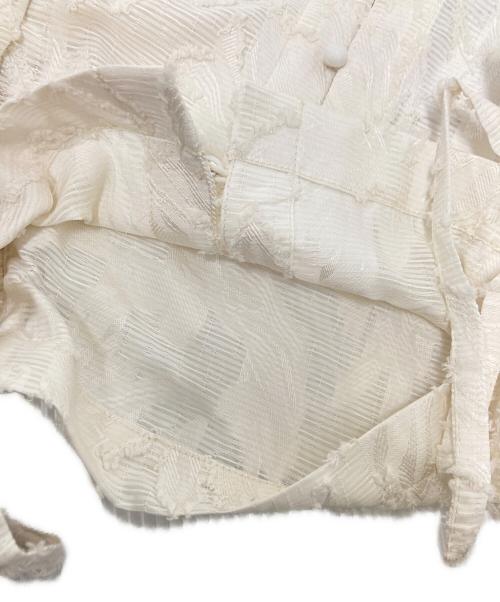 ANDREA & Co（アンドレアアンドコー）ANDREA & Co (アンドレアアンドコー) フリルジャガードベスト アイボリー サイズ:M 未使用品の古着・服飾アイテム