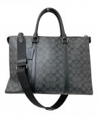 COACHコーチ）の古着「グラハム ジップ ブリーフ・シグネチャー キャンバス」｜ブラック