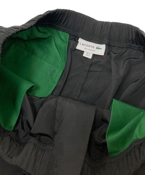 LACOSTE（ラコステ）LACOSTE (ラコステ) 耐水ワイドカーゴパンツ ブラック サイズ:US:Mの古着・服飾アイテム