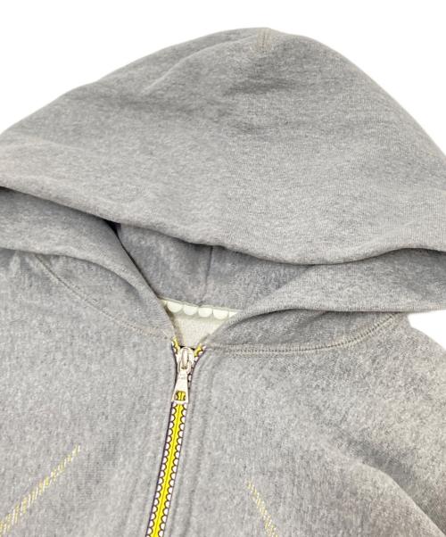 Original Fake（オリジナルフェイク）Original Fake (オリジナルフェイク) KAWS (カウズ) ジップパーカー グレー サイズ:3の古着・服飾アイテム