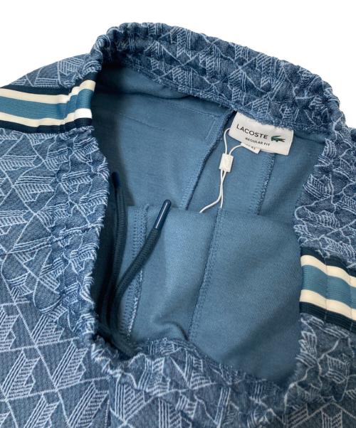 LACOSTE（ラコステ）LACOSTE (ラコステ) サイドテーピングモノグラムジャカードトラックパンツ ブルー サイズ:US:XSの古着・服飾アイテム
