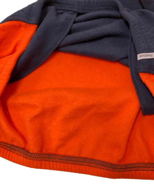 REEBOK（リーボック）REEBOK (リーボック) ハーフジップフリースジャケット ネイビー×オレンジ サイズ:XLの古着・服飾アイテム