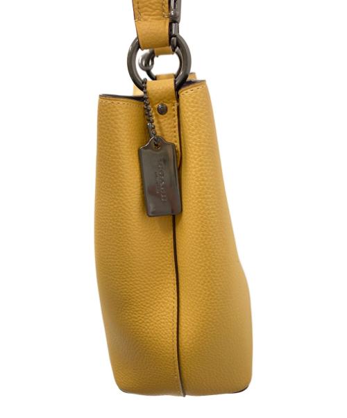 COACH（コーチ）COACH (コーチ) スモール タウン バケット バッグ イエローの古着・服飾アイテム