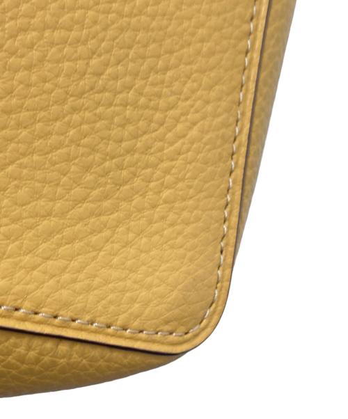 COACH（コーチ）COACH (コーチ) スモール タウン バケット バッグ イエローの古着・服飾アイテム