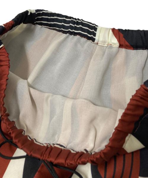 JOURNAL STANDARD（ジャーナルスタンダード）JOURNAL STANDARD (ジャーナルスタンダード) キカスカーフプリントパンツ ネイビー×オレンジ サイズ:38の古着・服飾アイテム