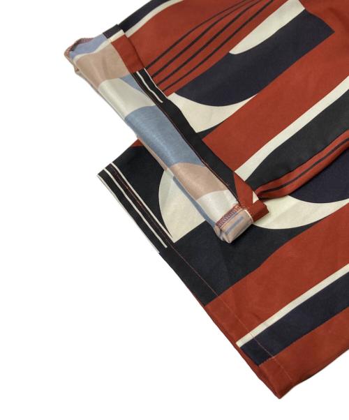 JOURNAL STANDARD（ジャーナルスタンダード）JOURNAL STANDARD (ジャーナルスタンダード) キカスカーフプリントパンツ ネイビー×オレンジ サイズ:38の古着・服飾アイテム