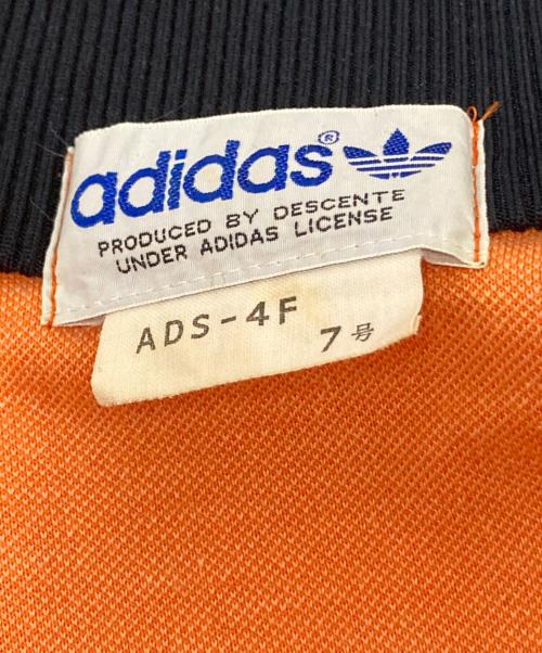 adidas（アディダス）adidas (アディダス) トラックジャケット オレンジ×ブラック サイズ:7号の古着・服飾アイテム