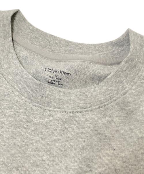 Calvin Klein（カルバンクライン）Calvin Klein (カルバンクライン) ロゴジャージーロングスリーブクロップドTシャツ グレー サイズ:Mの古着・服飾アイテム