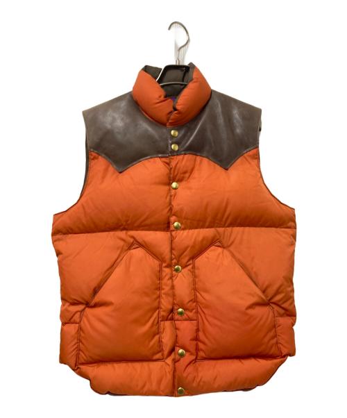 Rocky Mountain FeatherBed（ロッキーマウンテンフェザーベッド）Rocky Mountain FeatherBed (ロッキーマウンテンフェザーベッド) WAREHOUSE (ウエアハウス) ダウンベスト オレンジ×ブラウン サイズ:Mの古着・服飾アイテム
